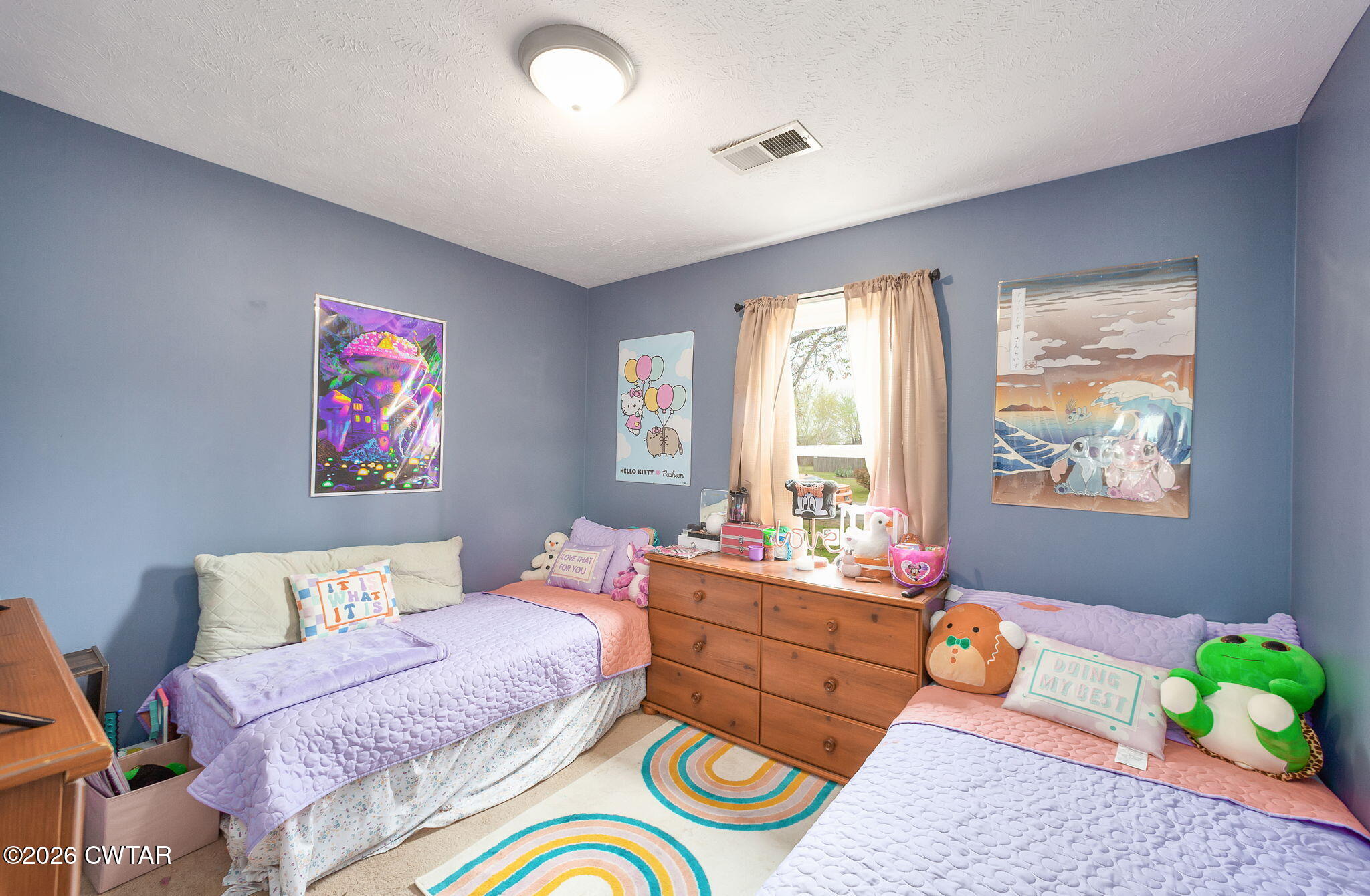 64 Ellendale Place Jackson, TN 38305 - Photo 14 of 19 a bed room with a bed and a couch