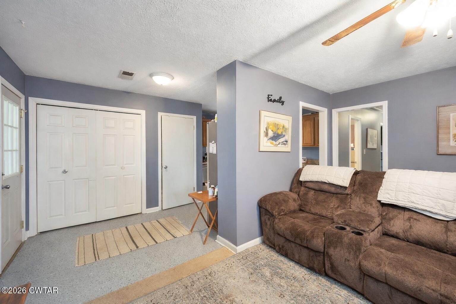 64 Ellendale Place Jackson, TN 38305 - Photo 8 of 19 a living room with furniture and a large window
