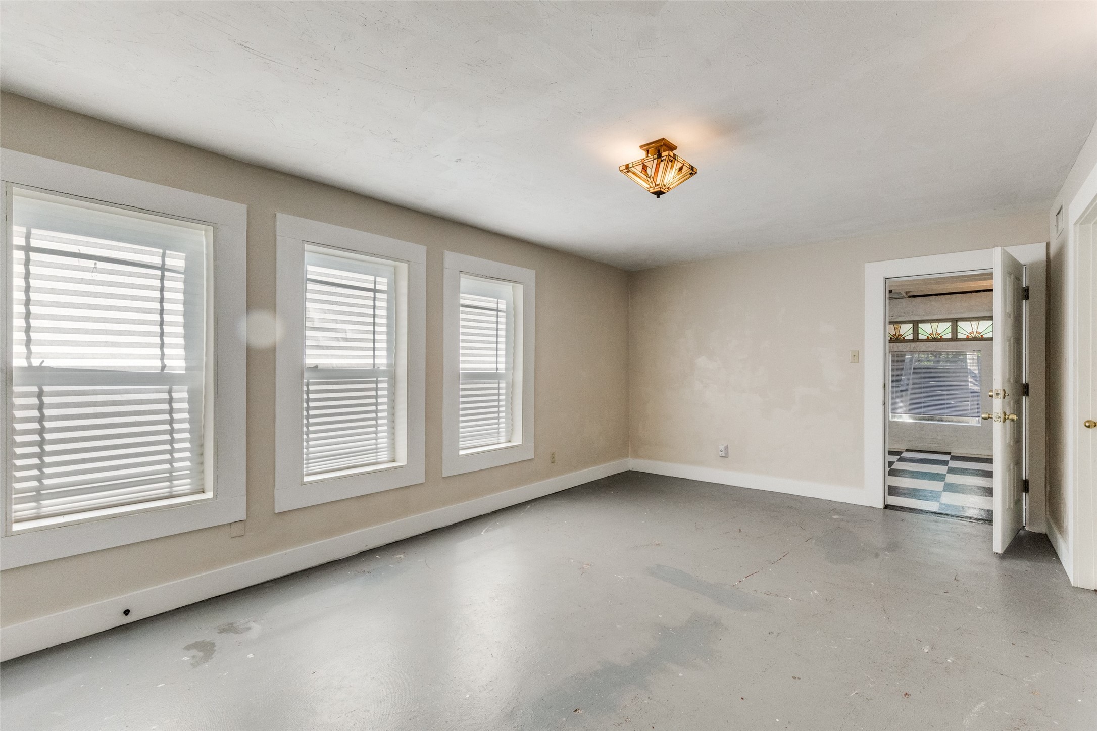 1005 Center Circle Salado, TX 76571 - Photo 11 of 25 The spacious primary suite D/S features concrete floors, and ensuite bath. Step into the sunroom right off the primary suite