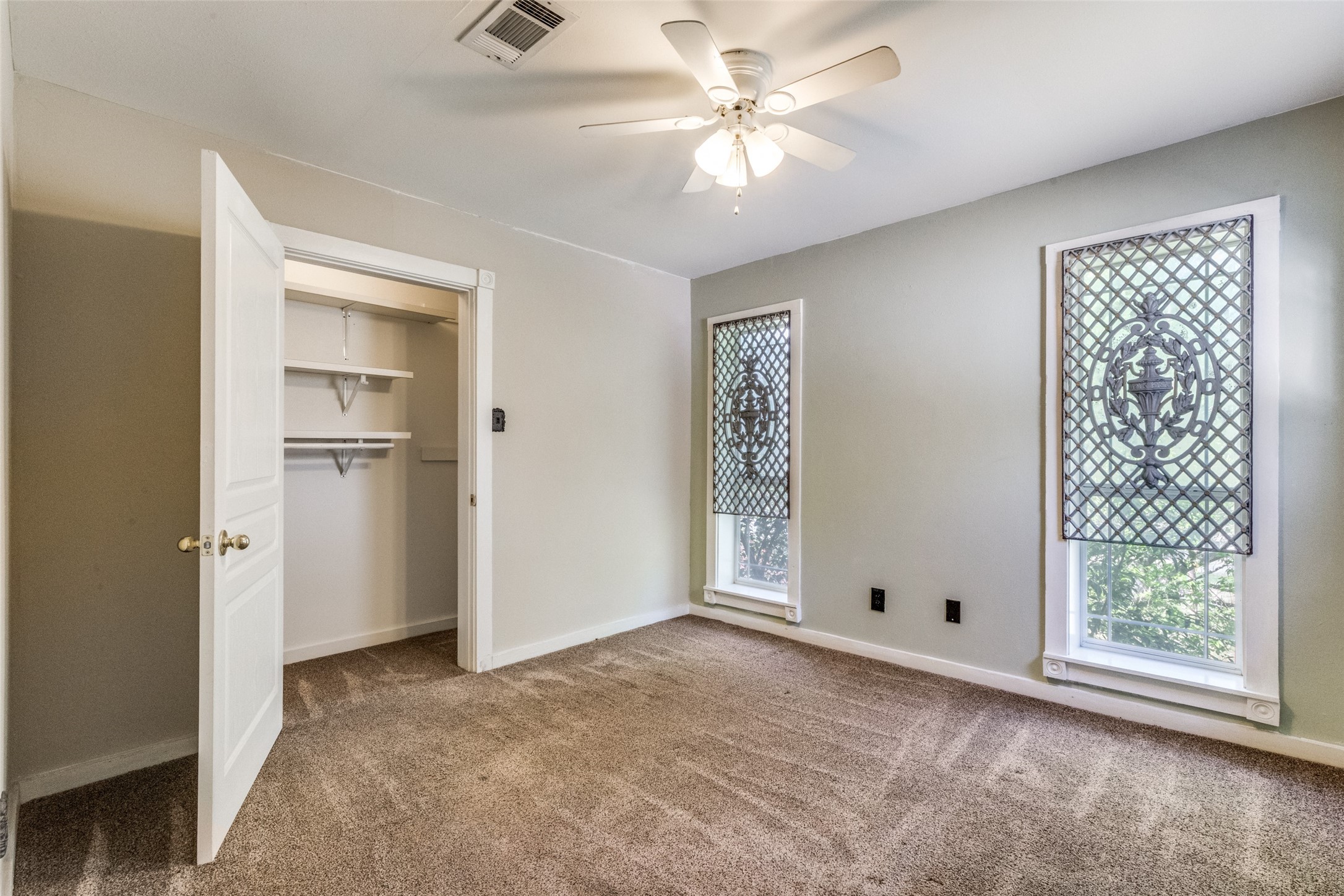 1005 Center Circle Salado, TX 76571 - Photo 19 of 25 This bedroom has a spacious closet and a great woodsy view.