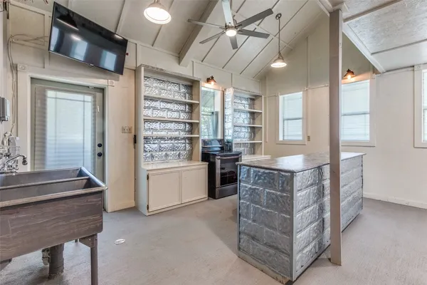 a view of a balcony with wooden floor
