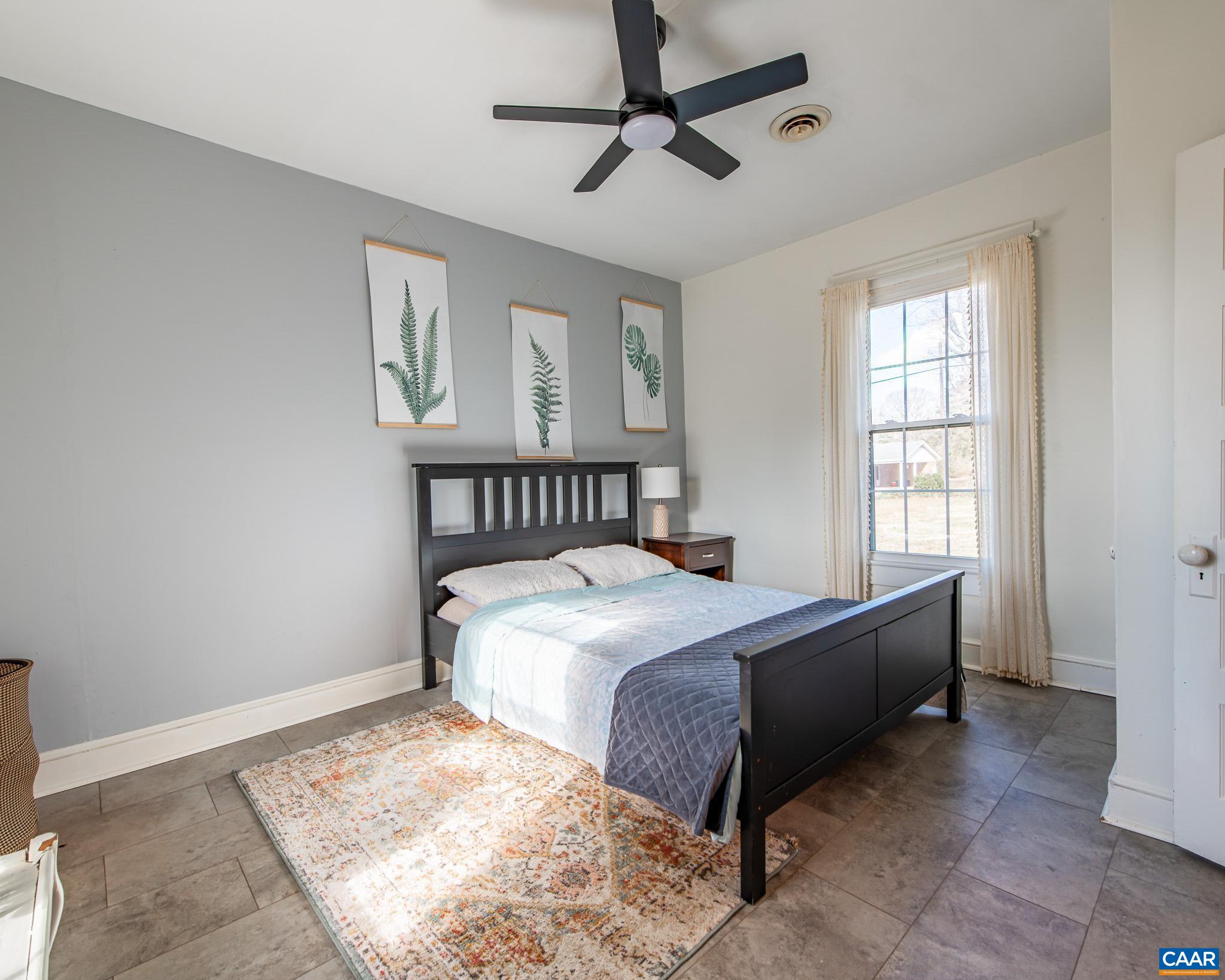 22 Quarter Lane Buckingham, VA 23921 - Photo 16 of 36 a bedroom with a bed and window