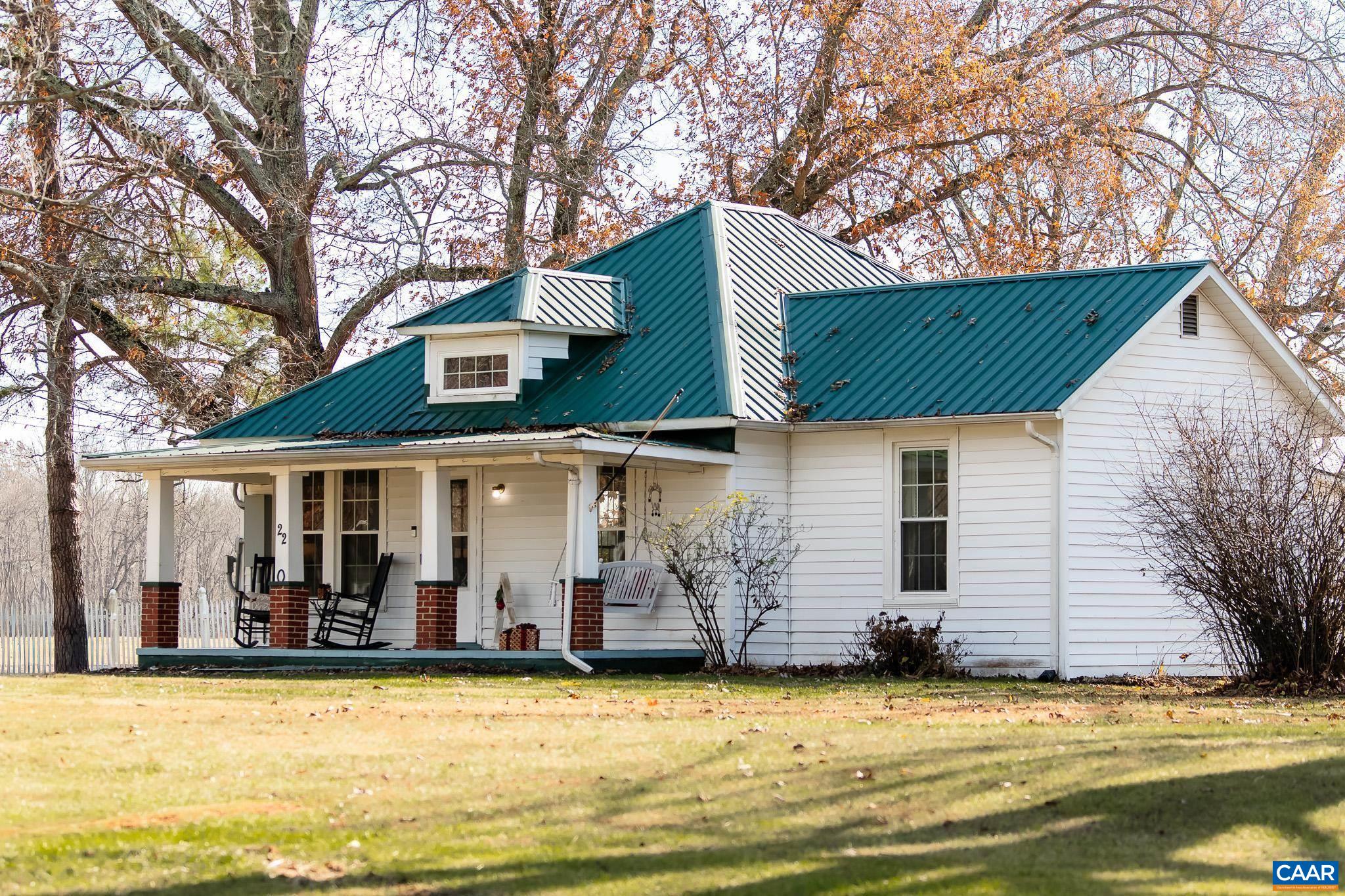22 Quarter Lane Buckingham, VA 23921 - Photo 2 of 36 a view of a house with a swimming pool and a tree