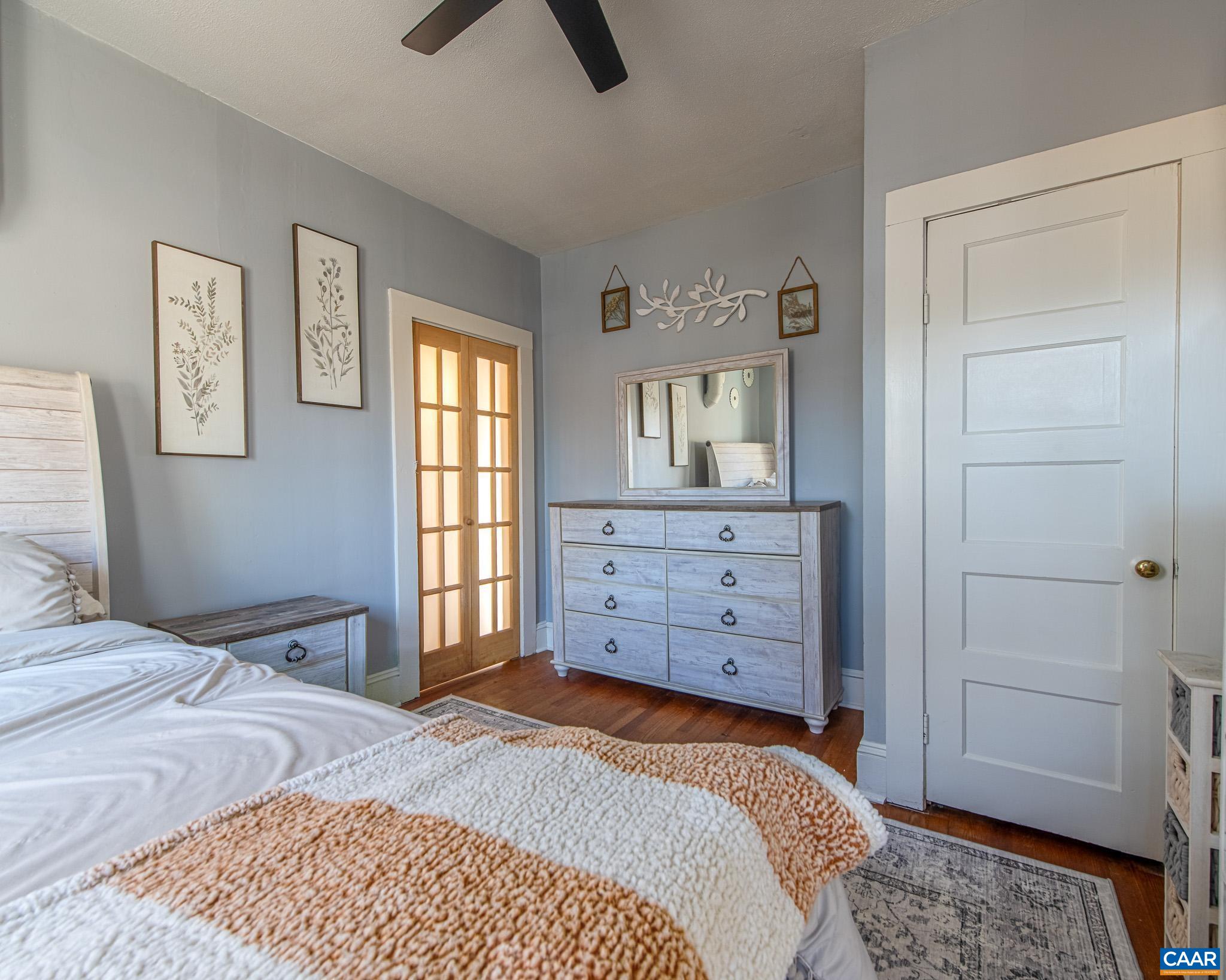 22 Quarter Lane Buckingham, VA 23921 - Photo 21 of 36 a bedroom with a bed and a dresser