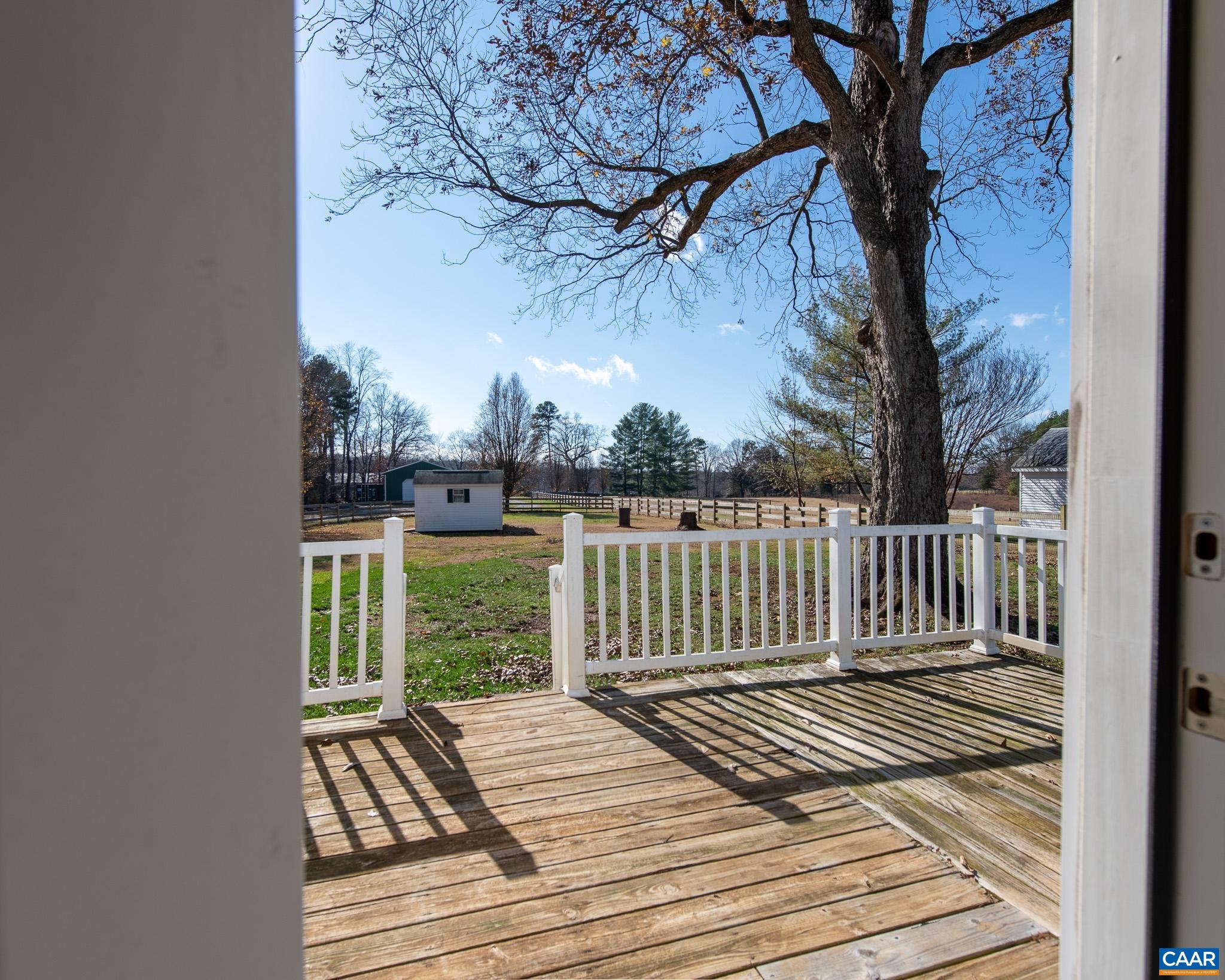22 Quarter Lane Buckingham, VA 23921 - Photo 29 of 36 a view of balcony with wooden floor and fence