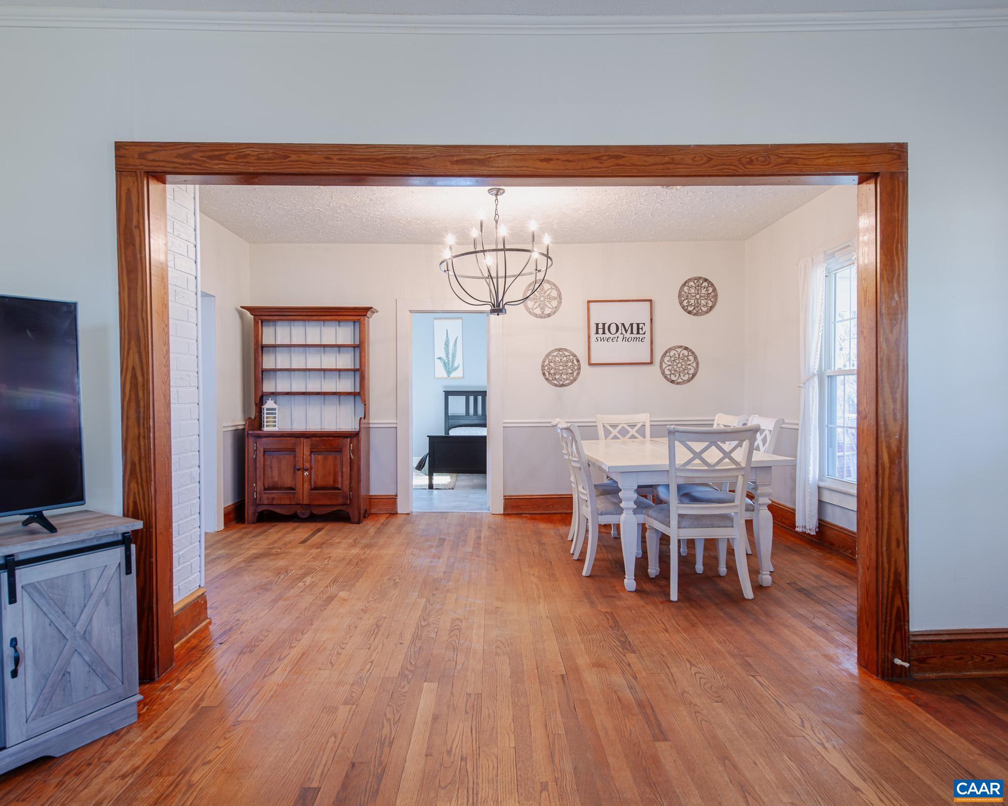 22 Quarter Lane Buckingham, VA 23921 - Photo 10 of 36 a view of a dining room with furniture and wooden floor