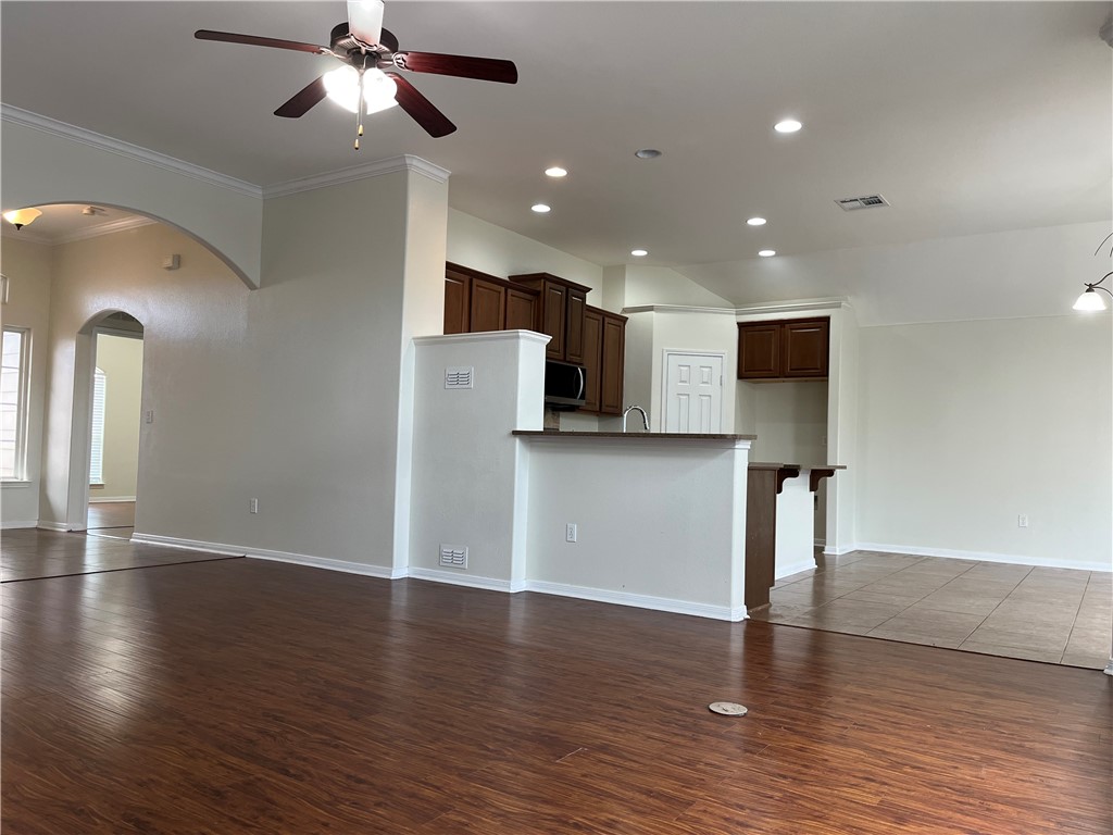 1406 Sacramento Street Portland, TX 78374 - Photo 17 of 35 a view of kitchen with stainless steel appliances refrigerator and microwave