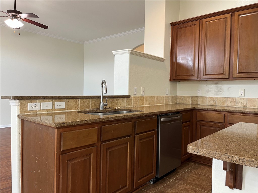 1406 Sacramento Street Portland, TX 78374 - Photo 20 of 35 a kitchen with a sink and cabinets