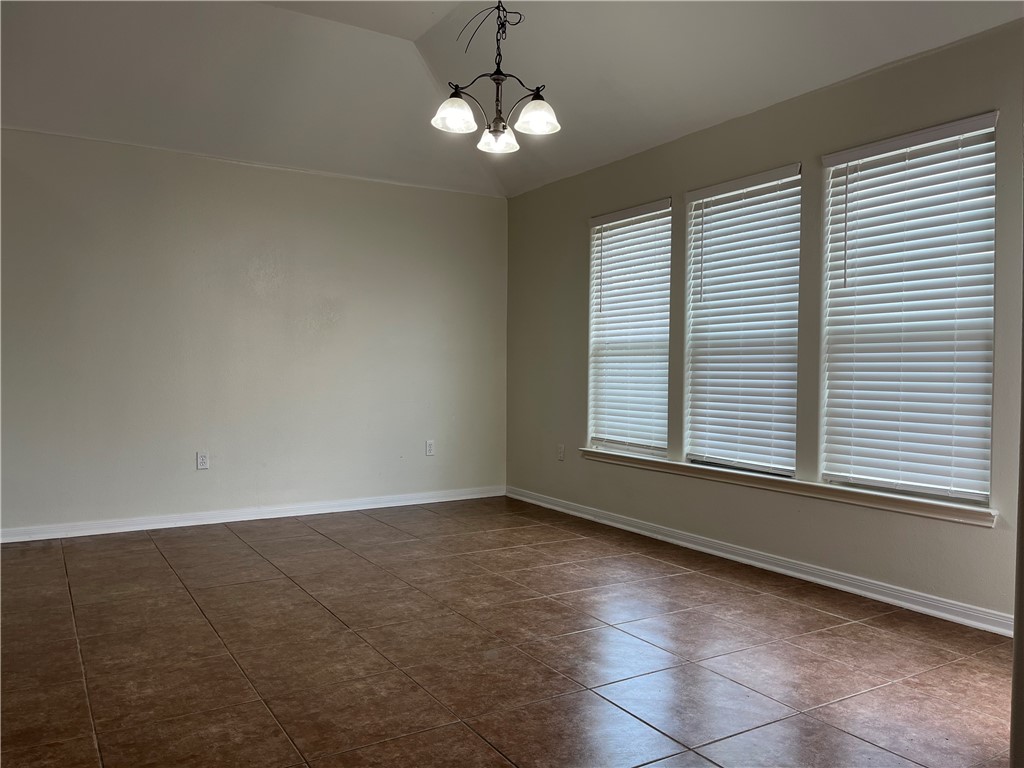 1406 Sacramento Street Portland, TX 78374 - Photo 23 of 35 a view of an empty room with a window