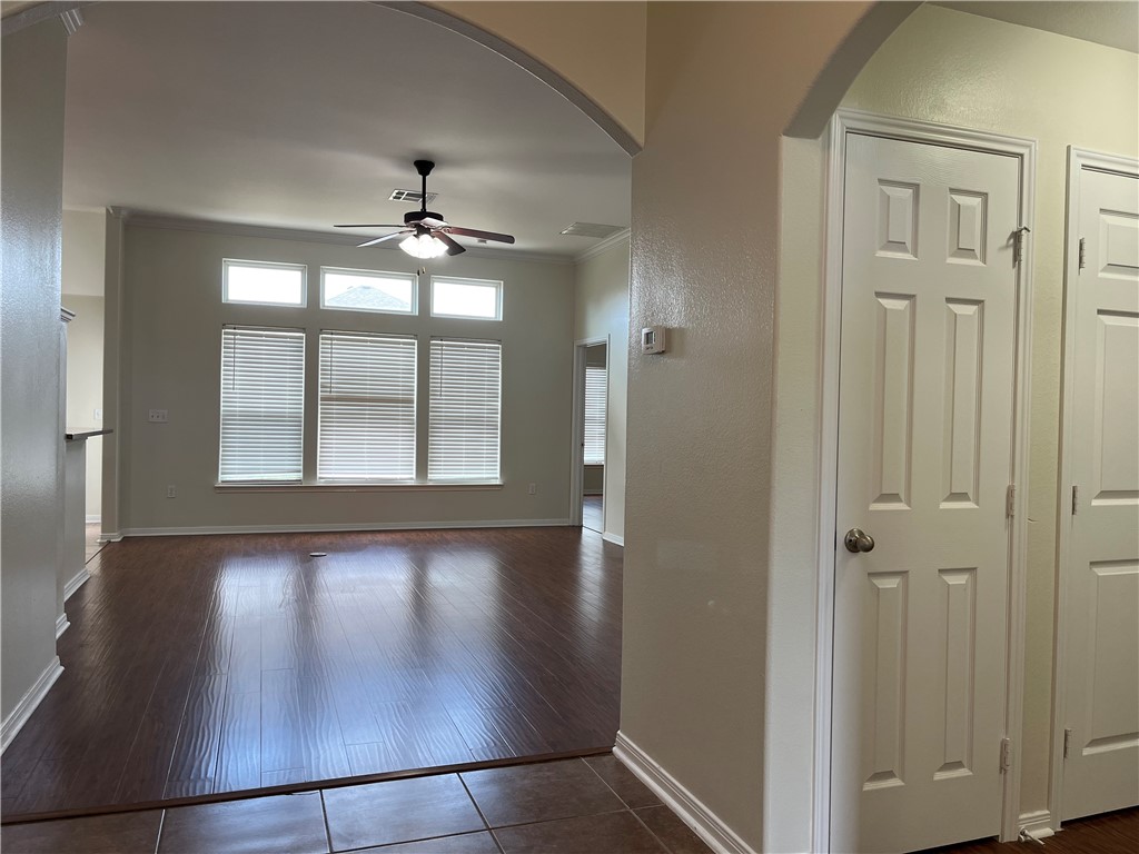 1406 Sacramento Street Portland, TX 78374 - Photo 3 of 35 wooden floor in an empty room with a window