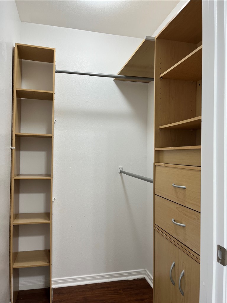 1406 Sacramento Street Portland, TX 78374 - Photo 31 of 35 a view of walk in closet with empty racks