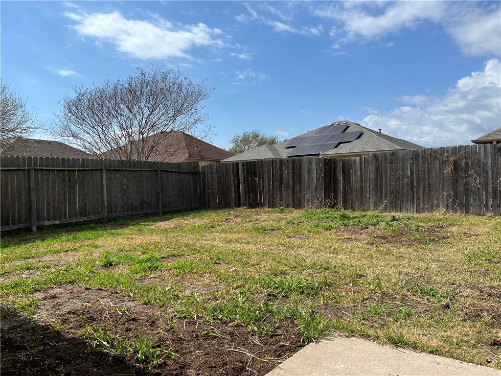 1406 Sacramento Street Portland, TX 78374 - Photo 33 of 35 a backyard of a house