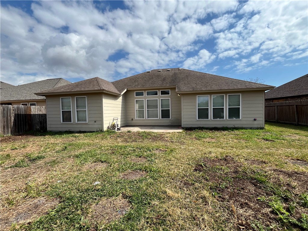 1406 Sacramento Street Portland, TX 78374 - Photo 35 of 35 a view of a house with a garden