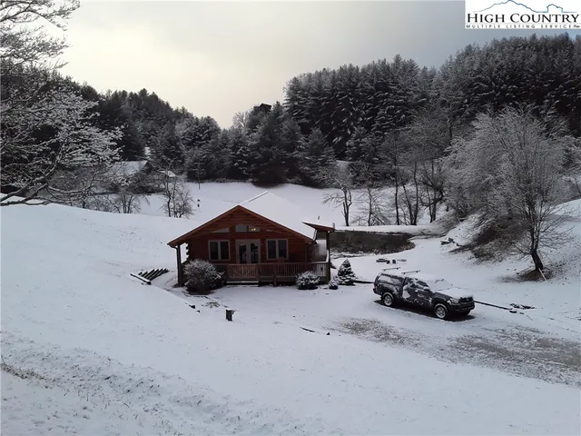 a car parked in front of a house