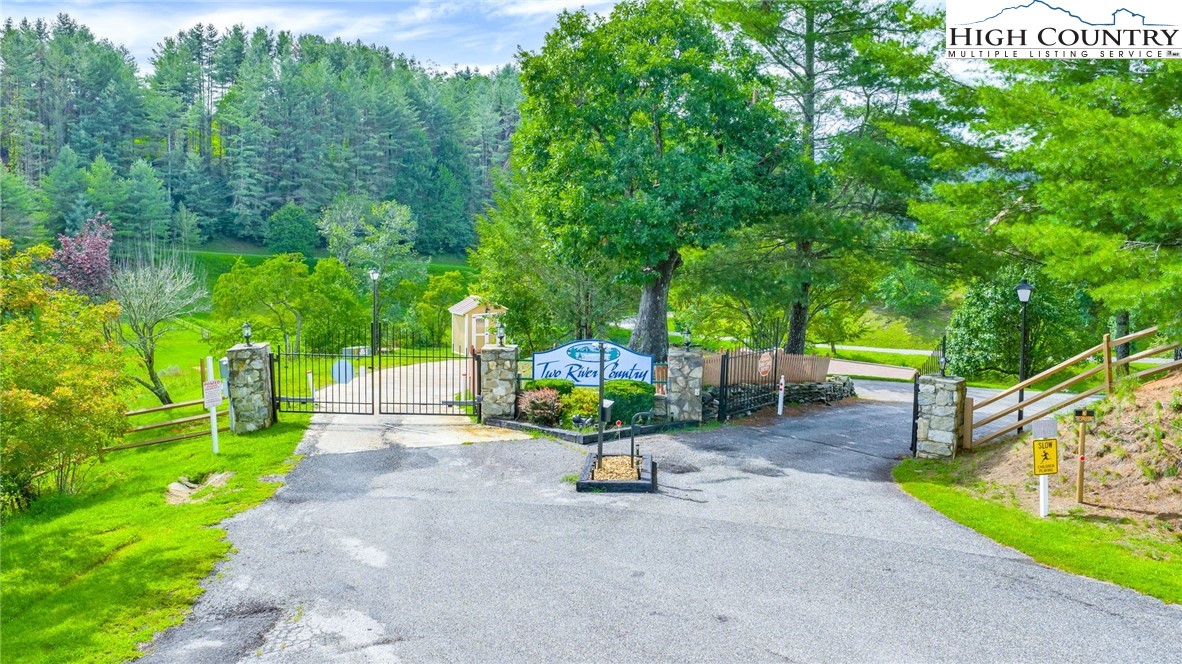 637 River Country Road Piney Creek, NC 28663 - Photo 45 of 49 a view of a park with large trees