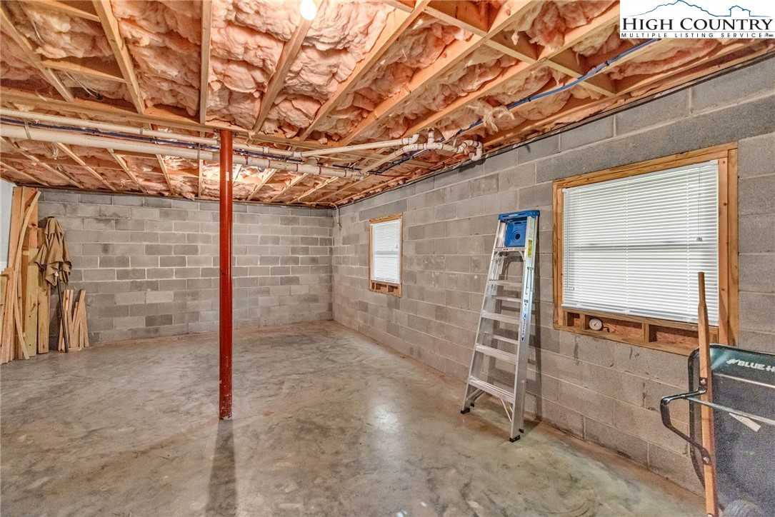 637 River Country Road Piney Creek, NC 28663 - Photo 48 of 49 a bathroom with a shower