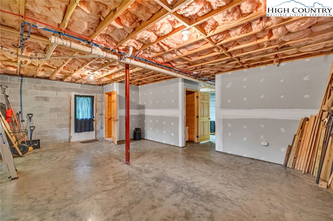 637 River Country Road Piney Creek, NC 28663 - Photo 49 of 49 a view of an empty room