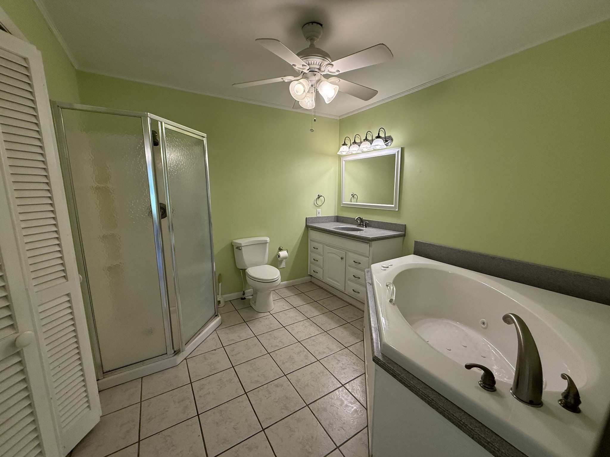 1419 Dripping Springs Road Winchester, TN 37398 - Photo 14 of 24 a bathroom with a sink and a mirror