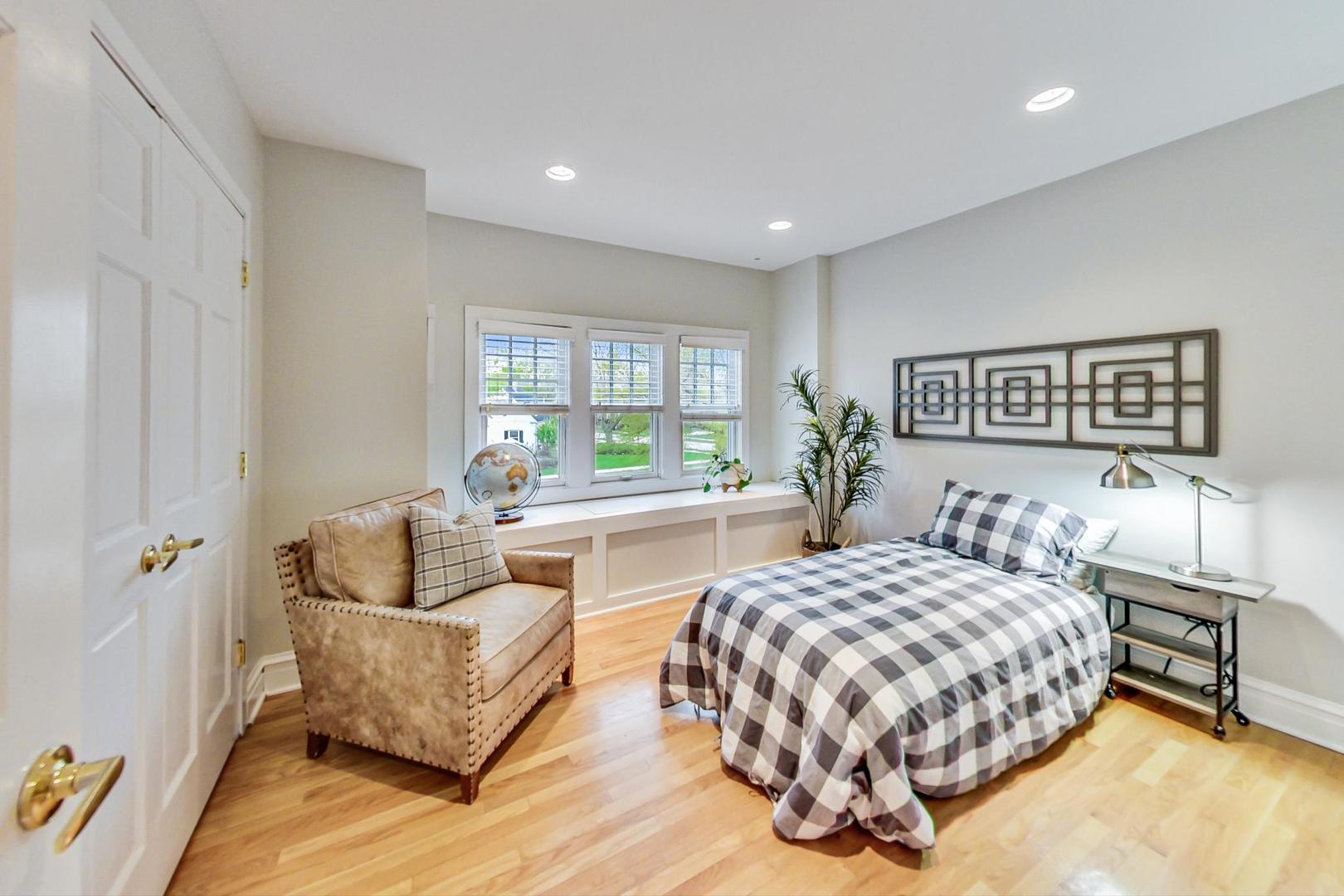 165 South Delaplaine Road Riverside, IL 60546 - Photo 29 of 51 a bedroom with a bed and a couch