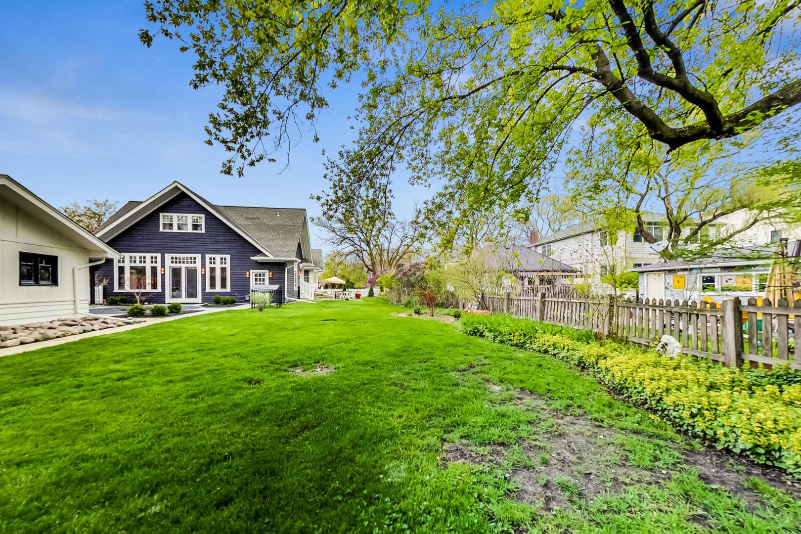 165 South Delaplaine Road Riverside, IL 60546 - Photo 42 of 51 a view of a house with a big yard plants and large trees