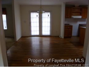 384 Tc Jones Road Raeford, NC 28376 - Photo 6 of 12 a view of a kitchen with an empty space and a window