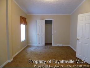 384 Tc Jones Road Raeford, NC 28376 - Photo 9 of 12 a view of an empty room and window