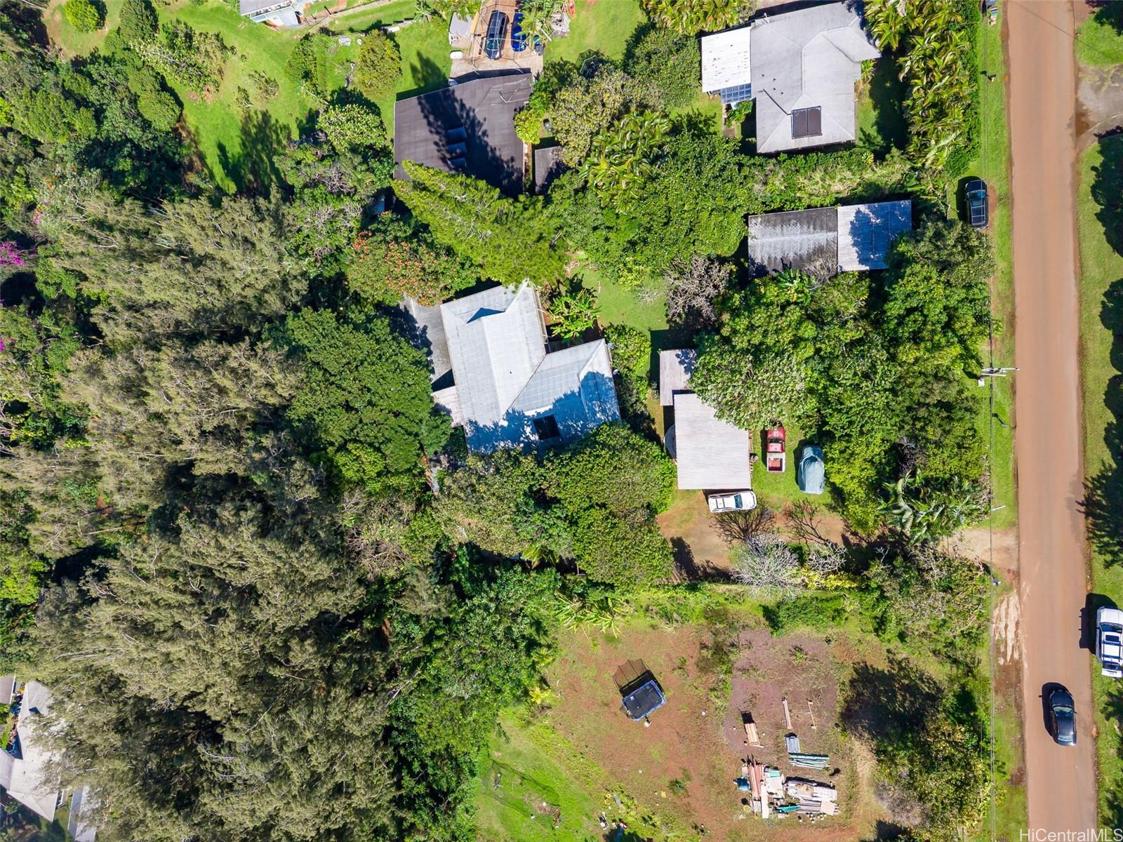 59-543 Alapio Road Haleiwa, HI 96712 - Photo 19 of 20 an aerial view of a house with a yard