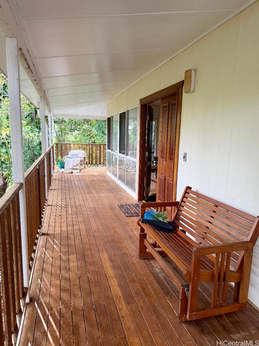 59-543 Alapio Road Haleiwa, HI 96712 - Photo 4 of 20 a view of a balcony with chairs