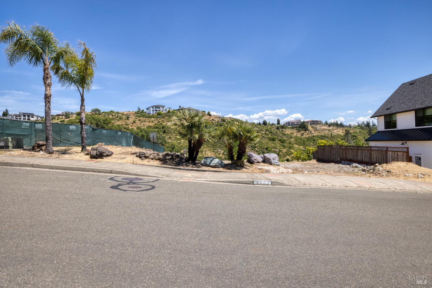 3752 Crown Hill Drive Santa Rosa, CA 95404 - Photo 8 of 24 a view of a road with a building in the background