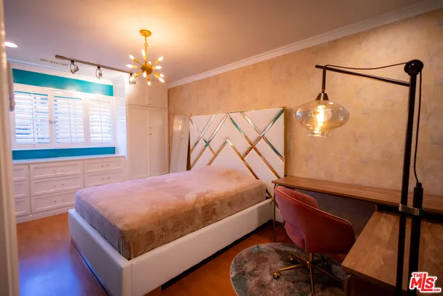 a bathroom with a sink toilet and a mirror