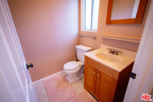 a view of a dining room with furniture wooden floor and chandelier