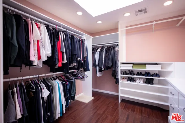 a view of an empty room with stairs