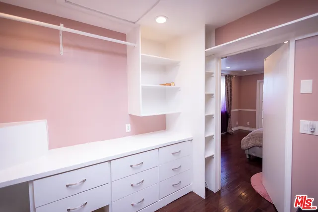 a aerial view of a house with a swimming pool