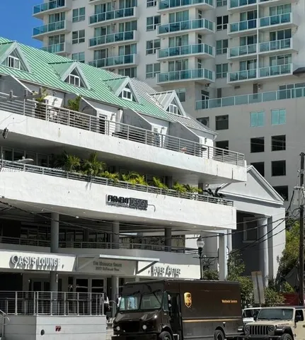a large building with a parking space