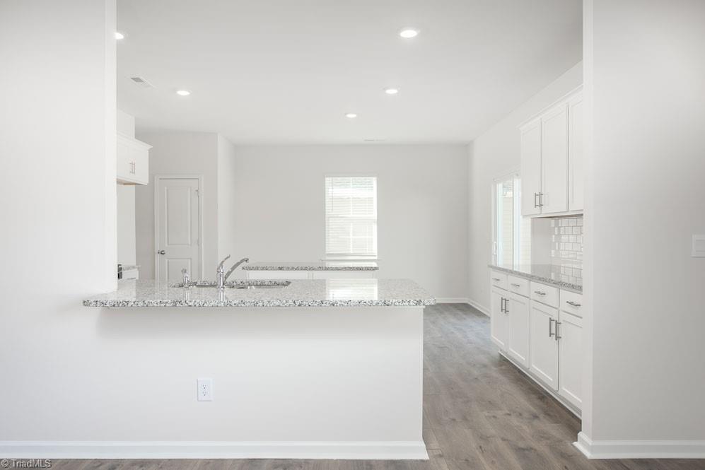 127 Black Willow Road Stokesdale, NC 27357 - Photo 11 of 30 The home model is a representative of its residential design