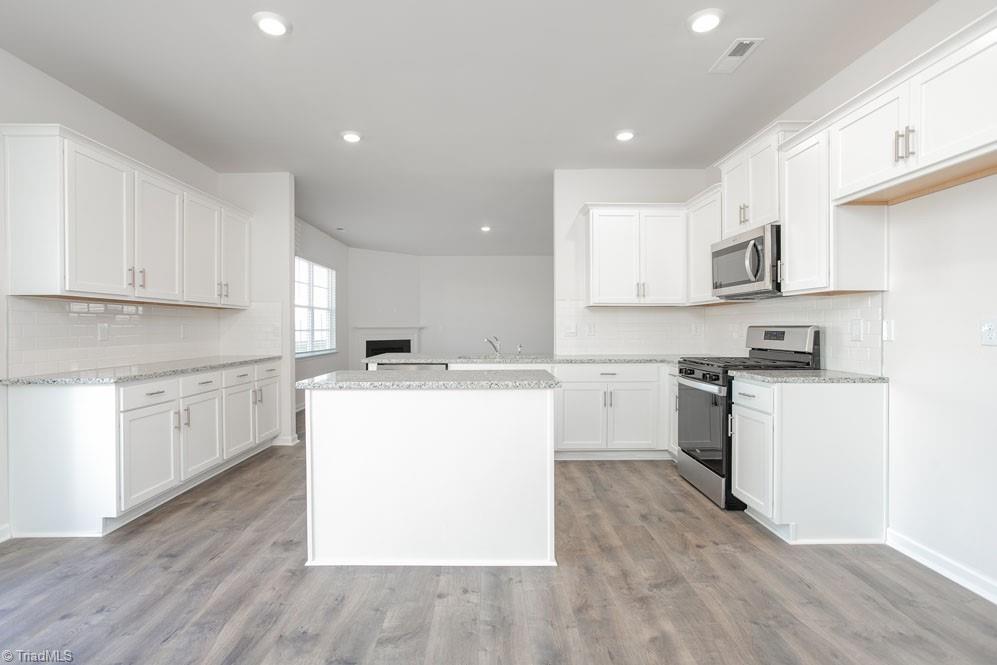 127 Black Willow Road Stokesdale, NC 27357 - Photo 14 of 30 The home model is a representative of its residential design