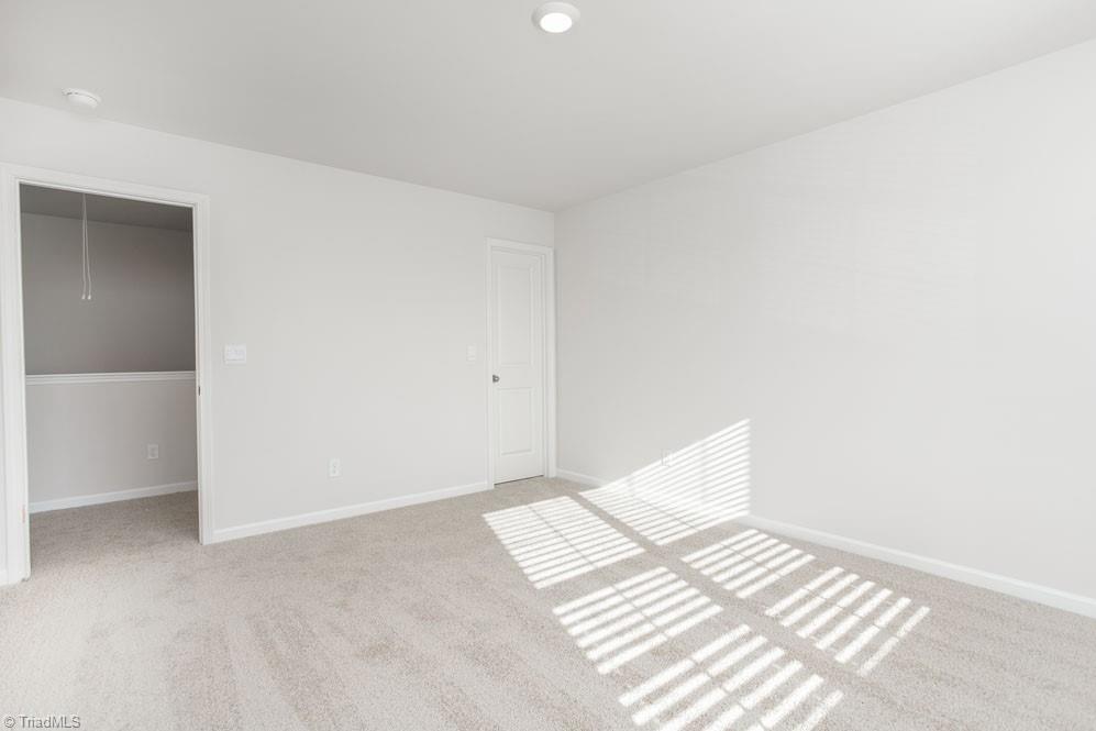 127 Black Willow Road Stokesdale, NC 27357 - Photo 25 of 30 The home model is a representative of its residential design