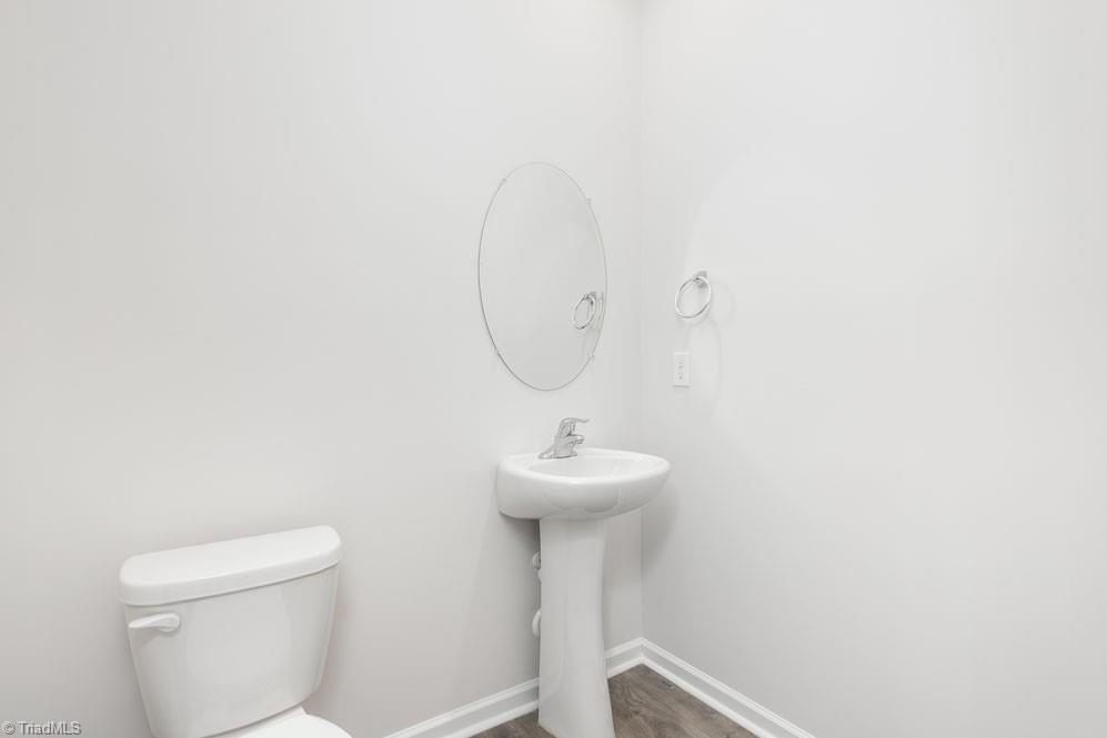 127 Black Willow Road Stokesdale, NC 27357 - Photo 7 of 30 The home model is a representative of its residential design