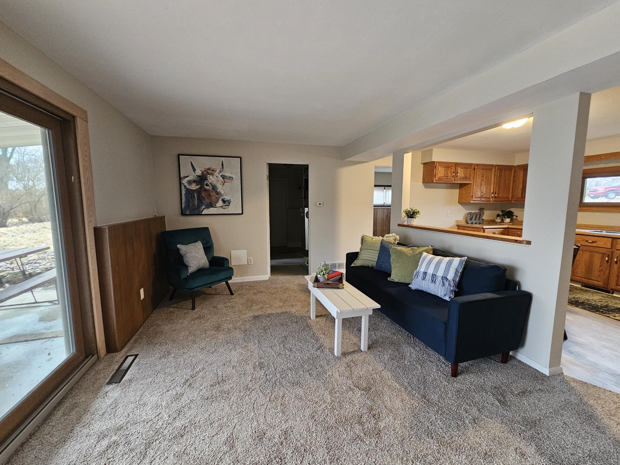 808 Crest View Trail Byron, IL 61010 - Photo 5 of 18 a living room with furniture and a flat screen tv