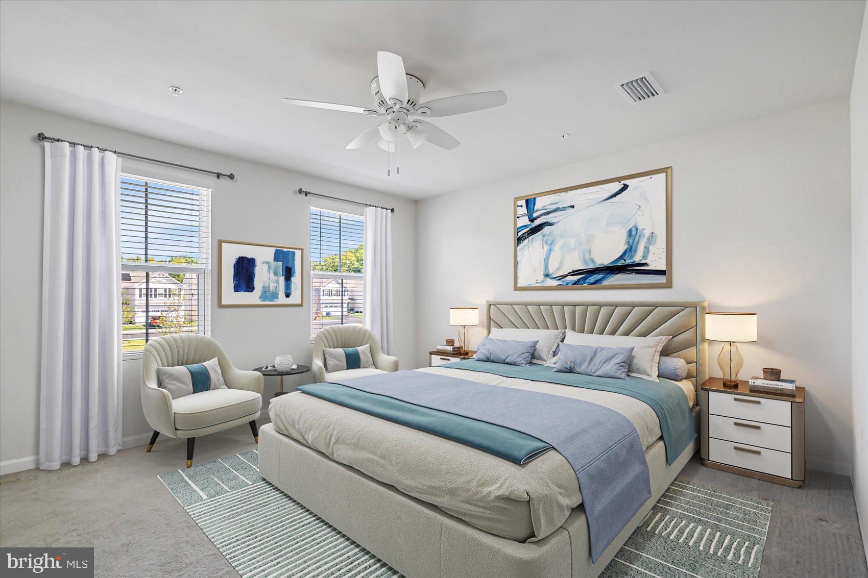 43 Olive Way Elkton, MD 21921 - Photo 21 of 44 a bedroom with a bed and a chandelier