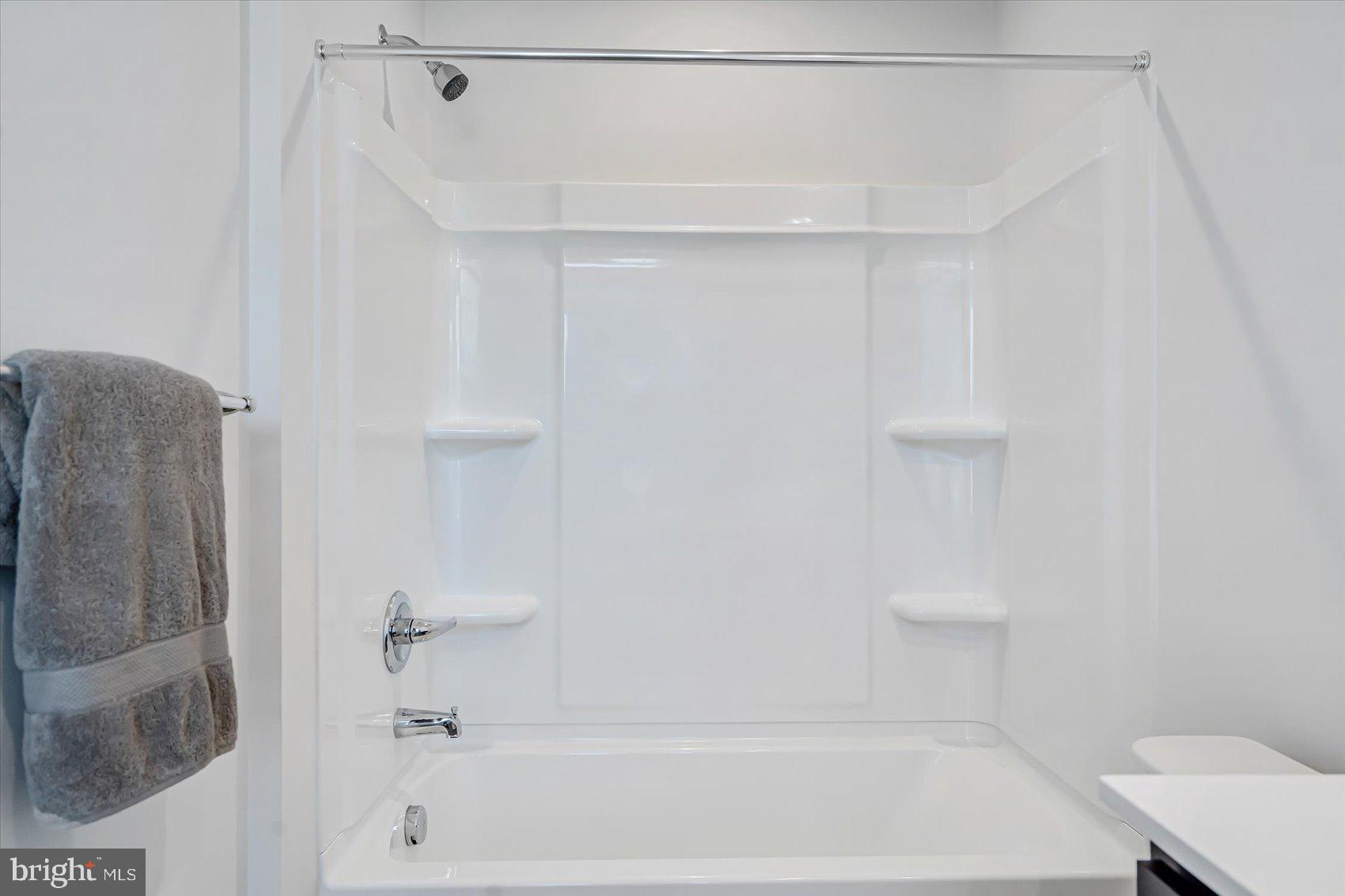 43 Olive Way Elkton, MD 21921 - Photo 25 of 44 a bathroom with a shower and a bath tub