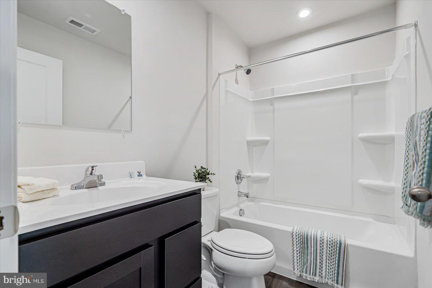 43 Olive Way Elkton, MD 21921 - Photo 29 of 44 a bathroom with a sink a toilet and a bathtub