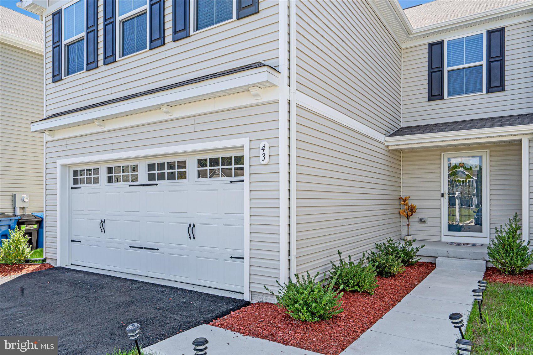 43 Olive Way Elkton, MD 21921 - Photo 4 of 44 a front view of a house with plants