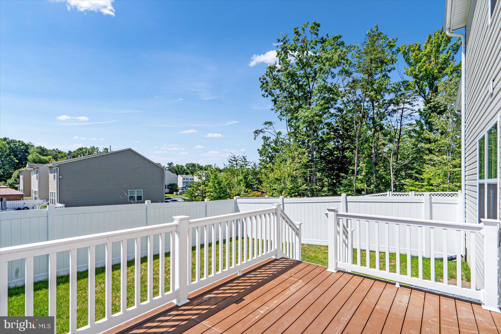 43 Olive Way Elkton, MD 21921 - Photo 7 of 44 a balcony with wooden floor and fence