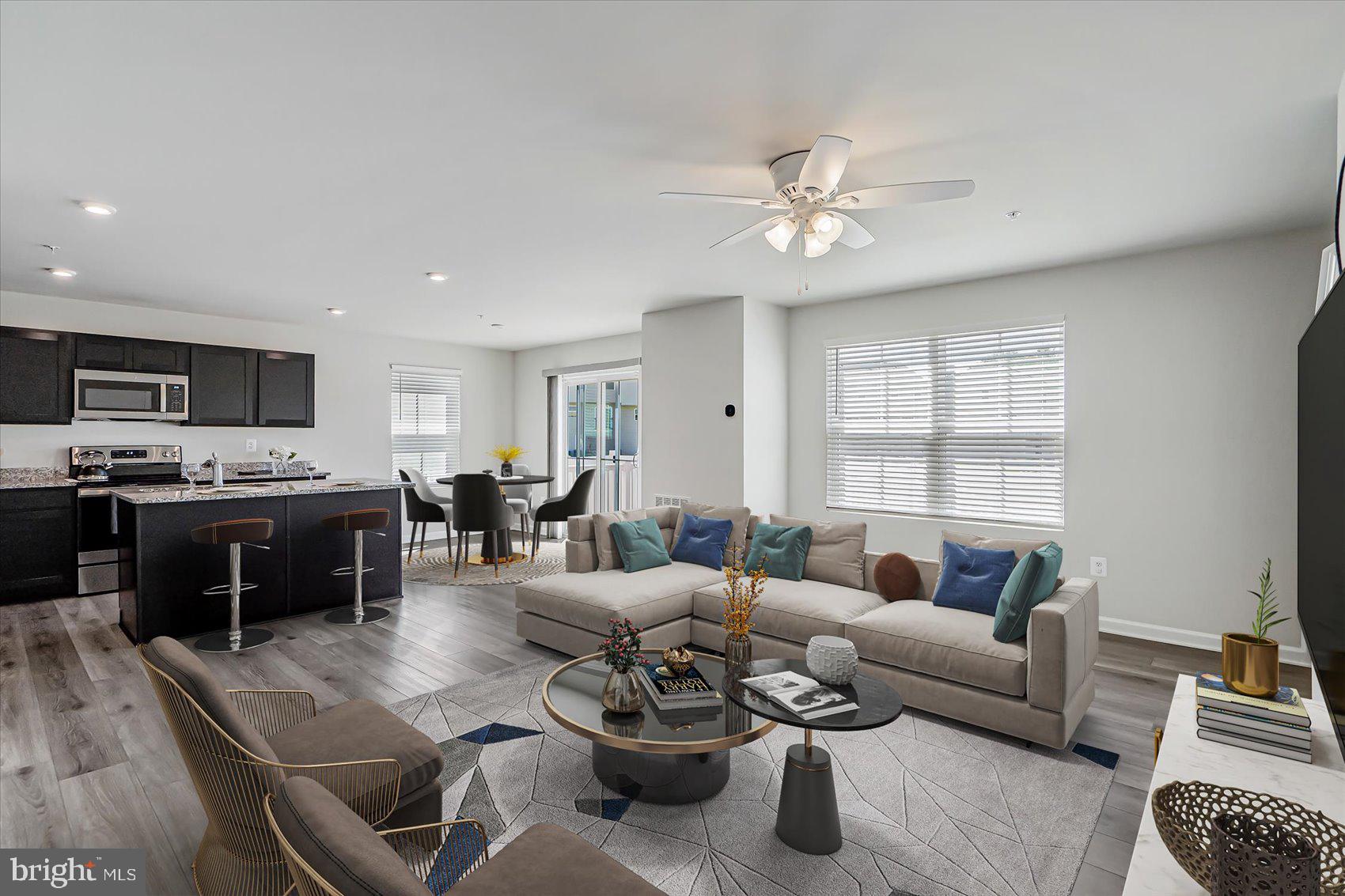43 Olive Way Elkton, MD 21921 - Photo 9 of 44 a living room with furniture kitchen view and a window