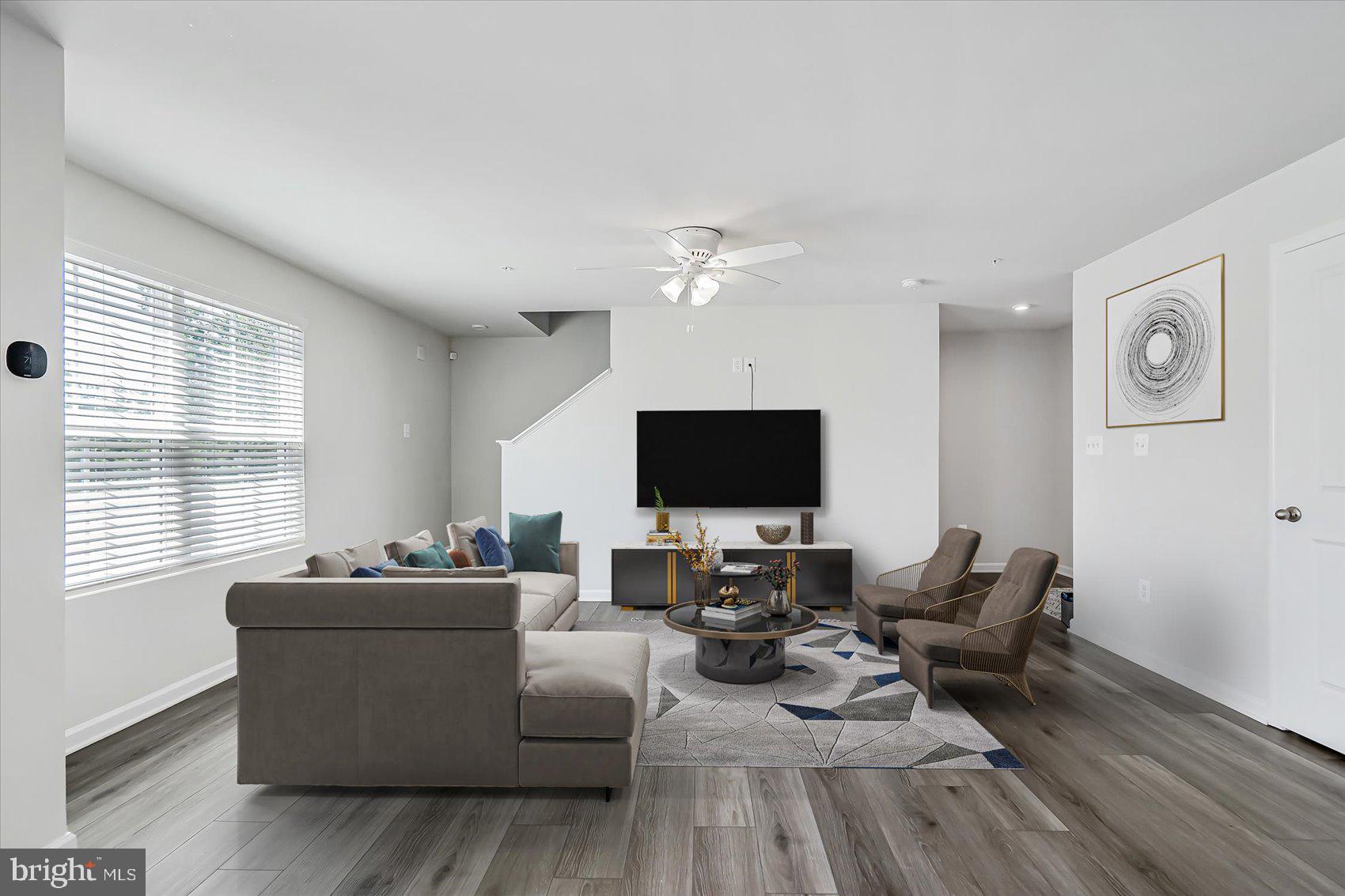 43 Olive Way Elkton, MD 21921 - Photo 10 of 44 a living room with furniture and a flat screen tv