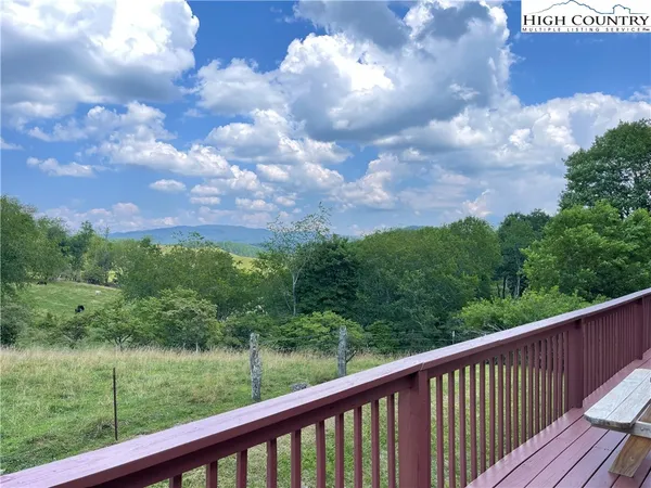 a balcony with an outdoor space