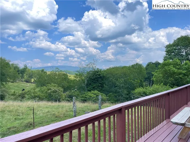 a balcony with an outdoor space