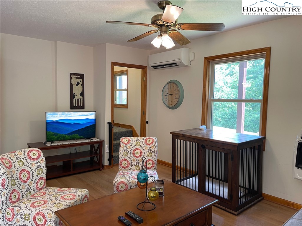 219 Lucky Alice Road Grassy Creek, NC 28631 - Photo 25 of 40 a bedroom with furniture and a window