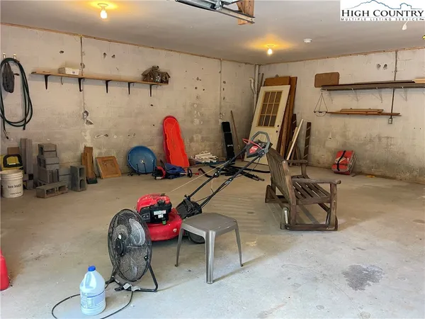 a room with gym equipment and mirror